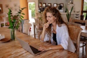 Onboarding tips for remote workers with woman Working Remotely