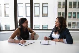 Two business women developing a mentor partnership